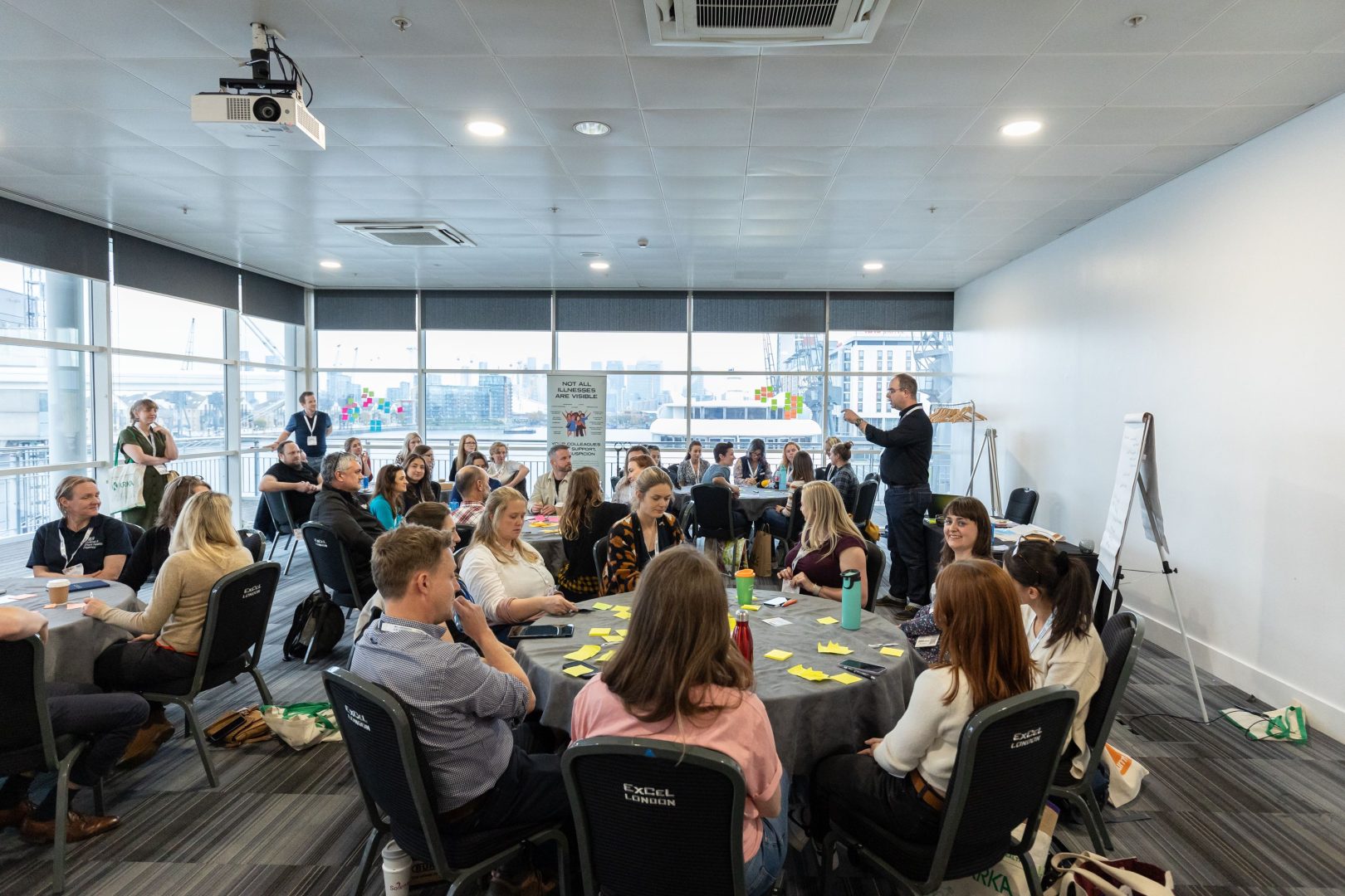 Veterinary professionals sharing ideas during a London Vet Show community workshop.